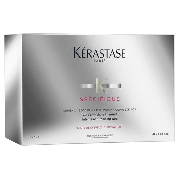 Kérastase Specifique hair care product packaging on a white background